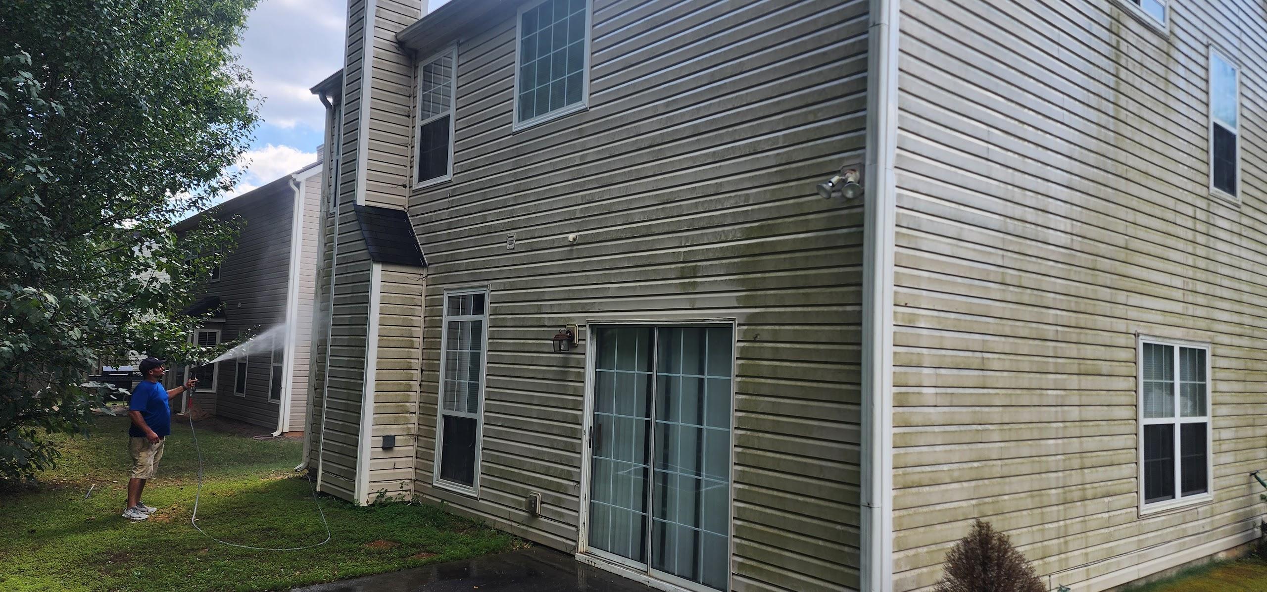 Before - House siding pressure washing transformation
