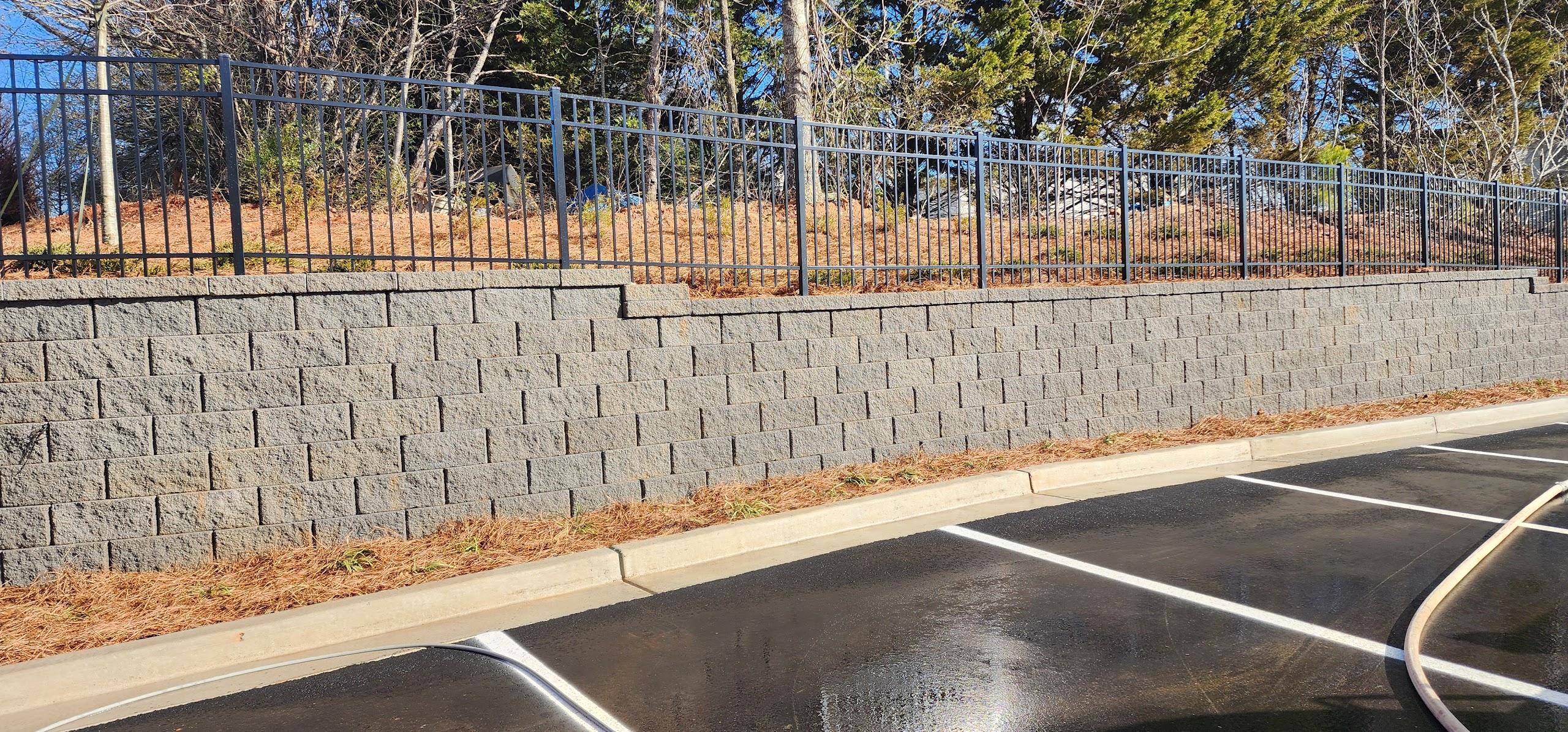 After - Retaining wall pressure washing results