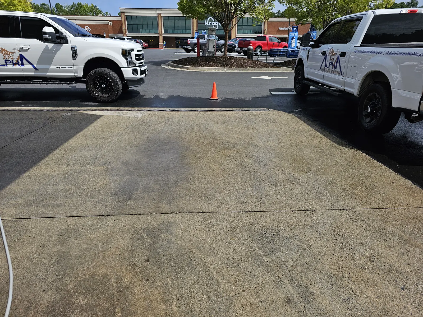 Kroger fuel station lot during a concrete wash, Dallas Highway, Due West, Cobb County, GA (Aug 2024)