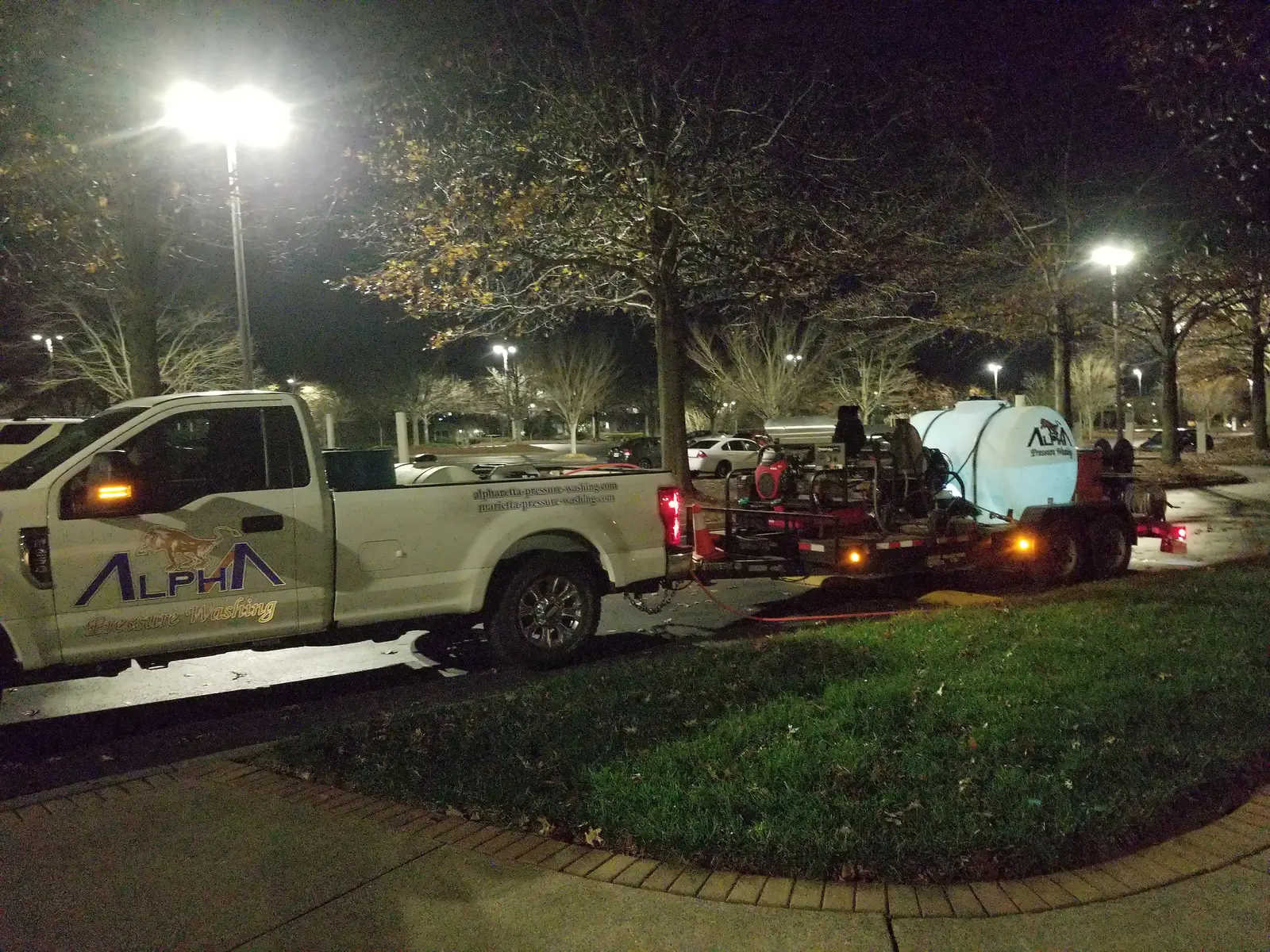 Night commercial pressure-washing job, Alpha Pressure Washing truck, Townpark Drive Northwest, Townpark Ravine One, Cobb County, GA (Dec 2018)