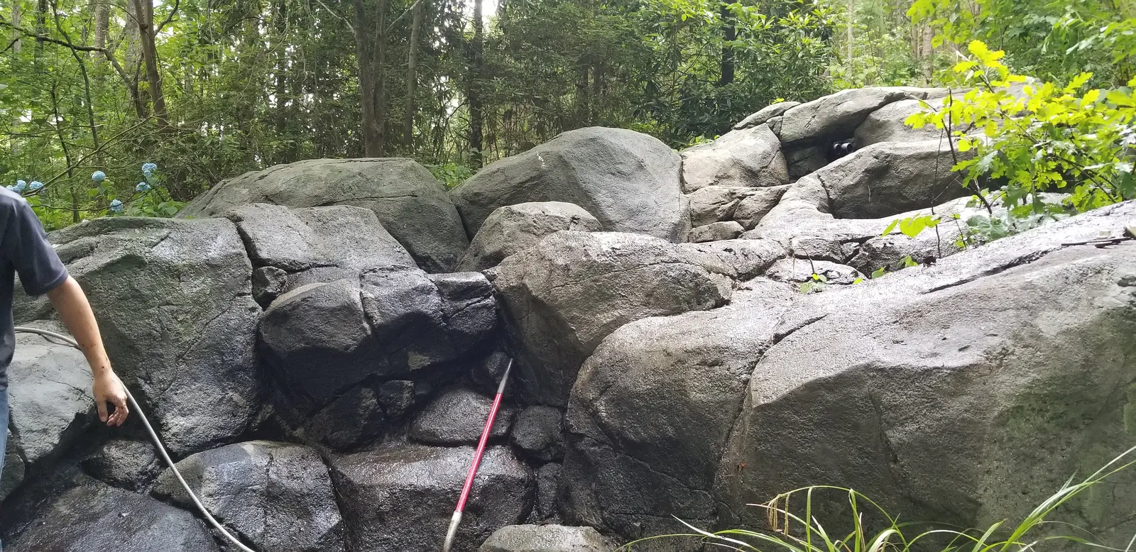 Crew cleaning the rock waterfall with a wand, Townpark Ravine office campus, Kennesaw, Cobb County, GA (May 31, 2019)